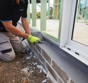 Pre construction termite treatment capping strip termite barrier